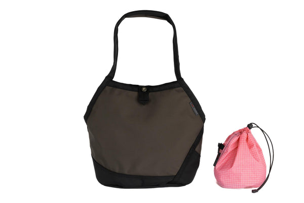The Swift in Ursa (greyish-brown) Ballistic with a Sakura (pale pink with white grid) interior and Medium Yarn Stuff Sack